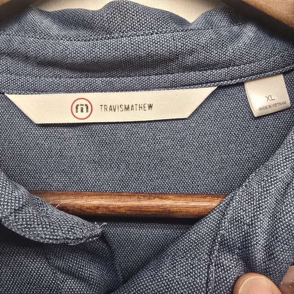 Travis Mathew Heathered Navy Short Sleeve Performance Polo - Picture 4 of 7